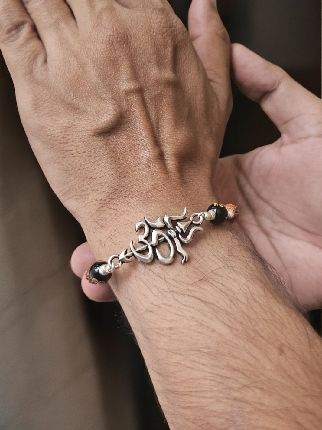 Motif of Om with Rudraksh Silver Bracelet